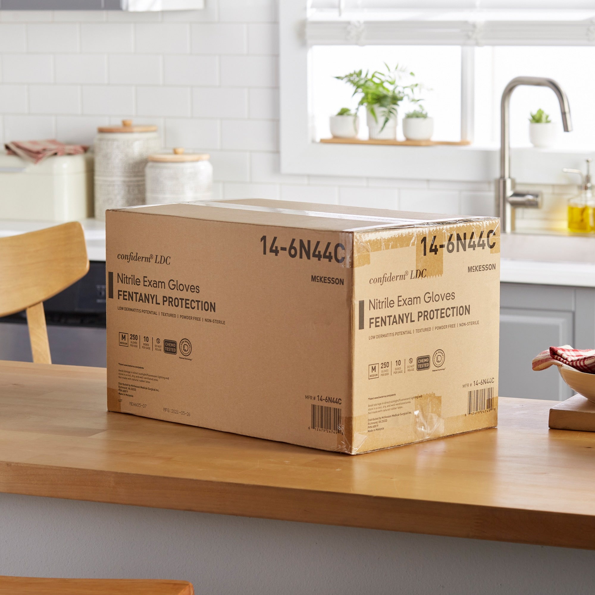 exam glove mckesson confiderm ldc medium nonsterile nitrile standard cuff length fully textured blue chemo tested fentanyl tested packaging type box