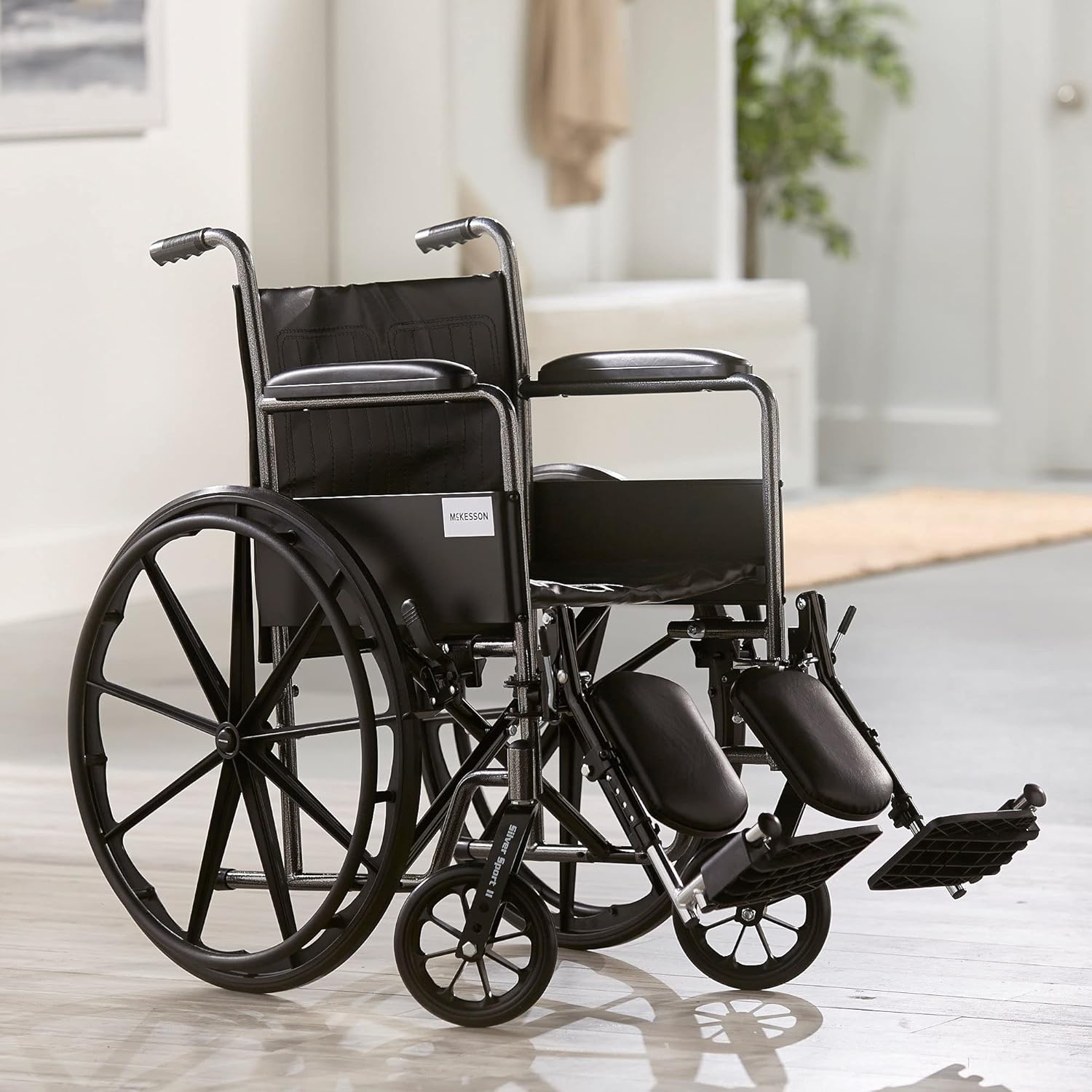 Wheelchair McKesson Dual Axle Full Length Arm Swing-Away Elevating Legrest Black Upholstery 18 Inch Seat Width Adult 300 lbs. Weight Capacity, Packaging Type- Each
