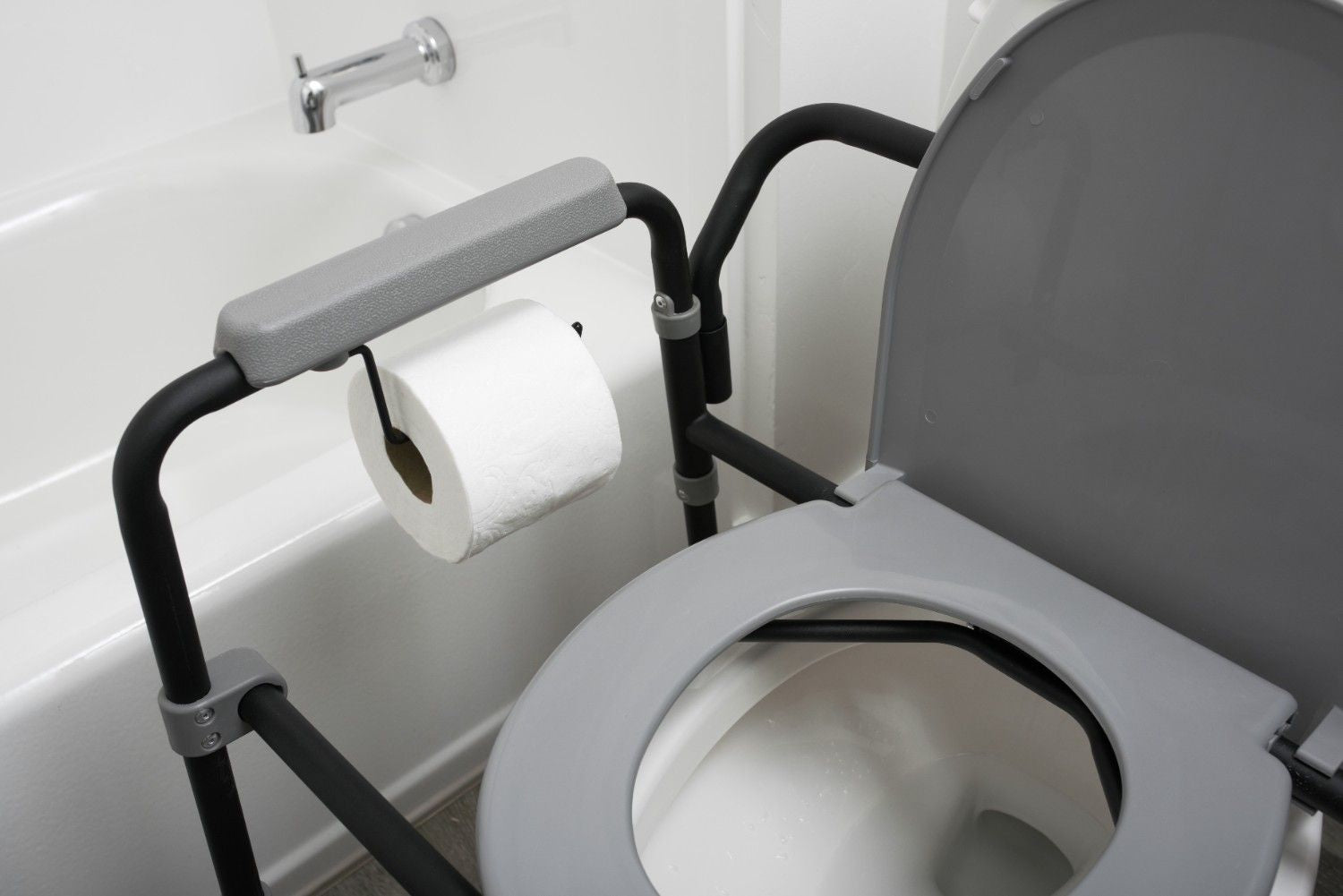 Universal Bedside Commode - Portable, Adjustable, and Easy-to-Clean Toilet Solution for Seniors and Mobility Impaired. Perfect for Comfort and Convenience.