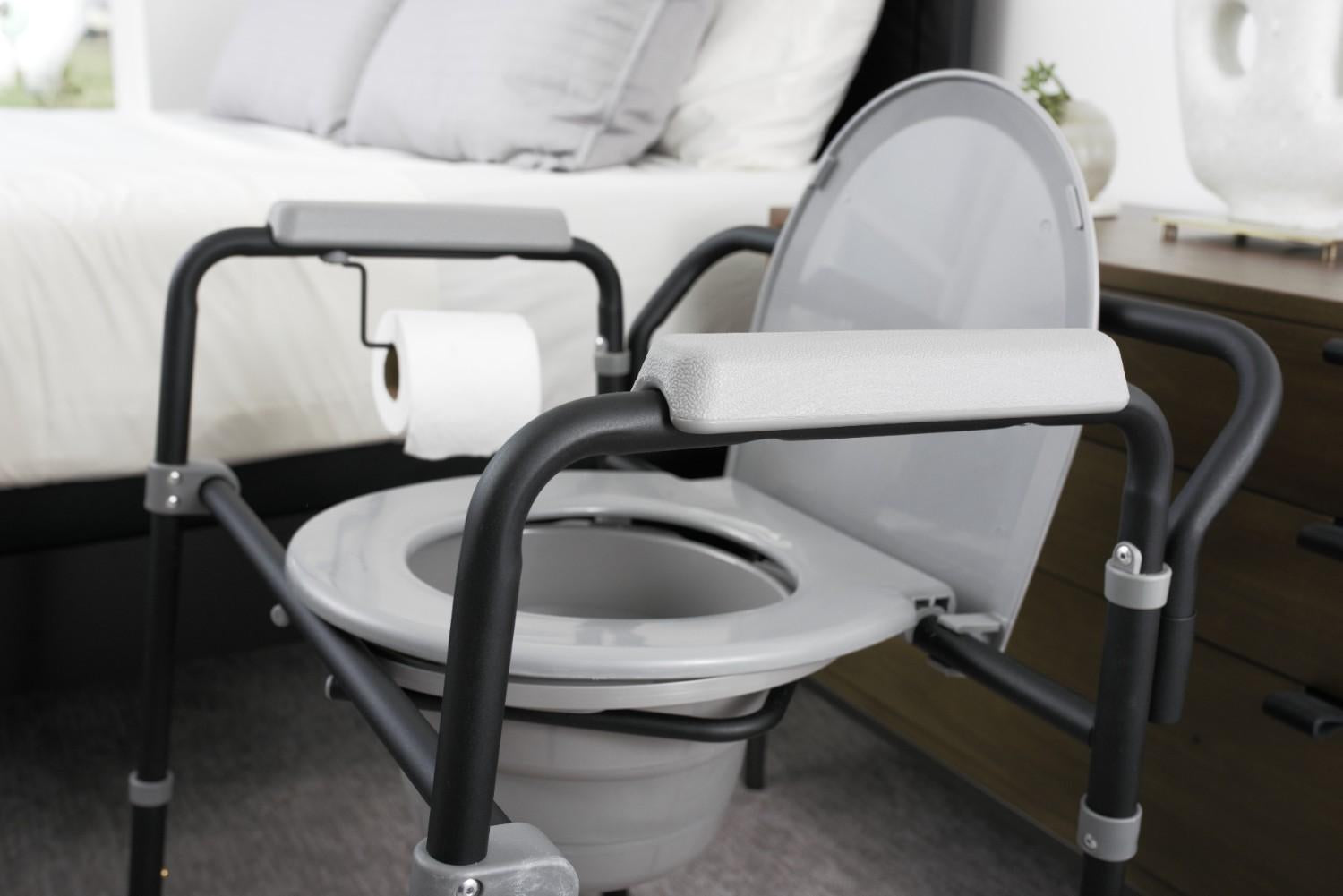 Universal Bedside Commode - Portable, Adjustable, and Easy-to-Clean Toilet Solution for Seniors and Mobility Impaired. Perfect for Comfort and Convenience.