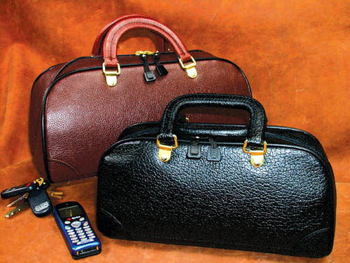 Bolsa médica con cremallera de 12 unidades de cuero negro granulado