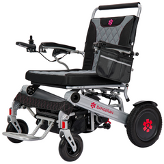 Silver electric wheelchair with black padded seat and joystick control