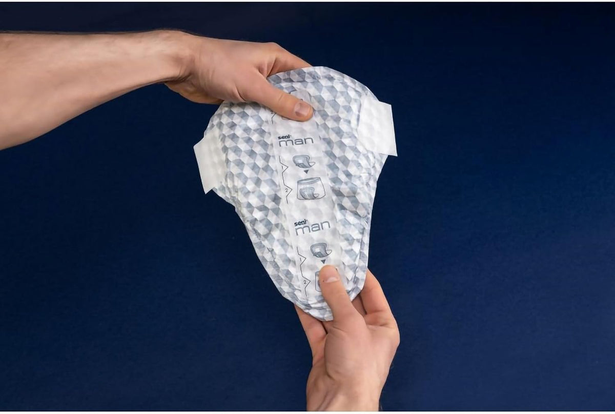 bladder control pad seni man active 8 9 10 x 10 3 5 inch moderate absorbency super absorbent core one size fits most packaging type case