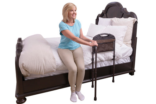 pivoting bed rail