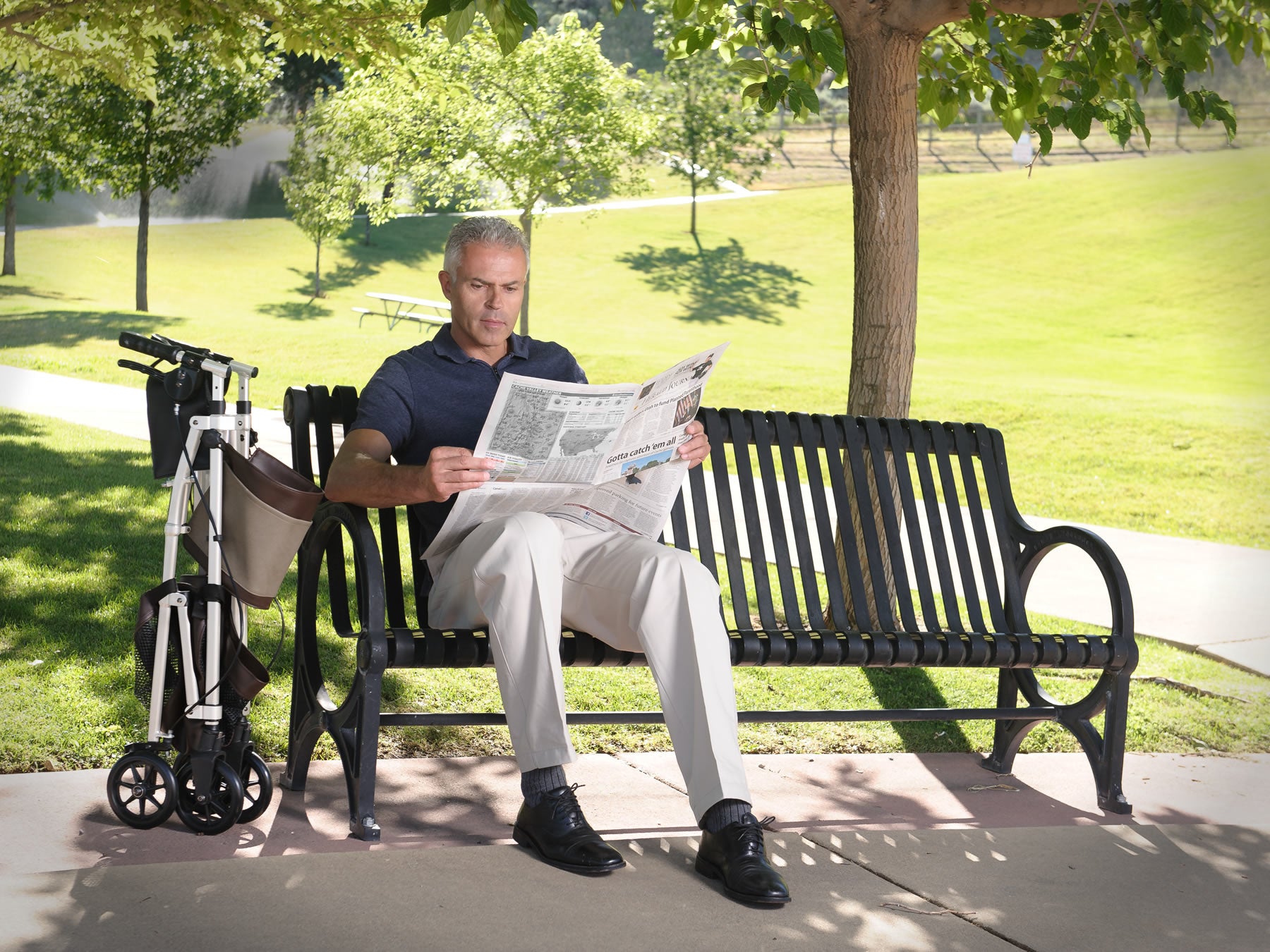 Elite Travel Rollator - Lightweight, foldable design for easy transport. Features ergonomic hand grips and adjustable height for comfort. Perfect for mobility on the go!