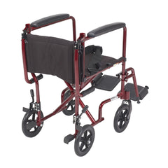 McKesson red aluminum transport chair with swing-away footrests