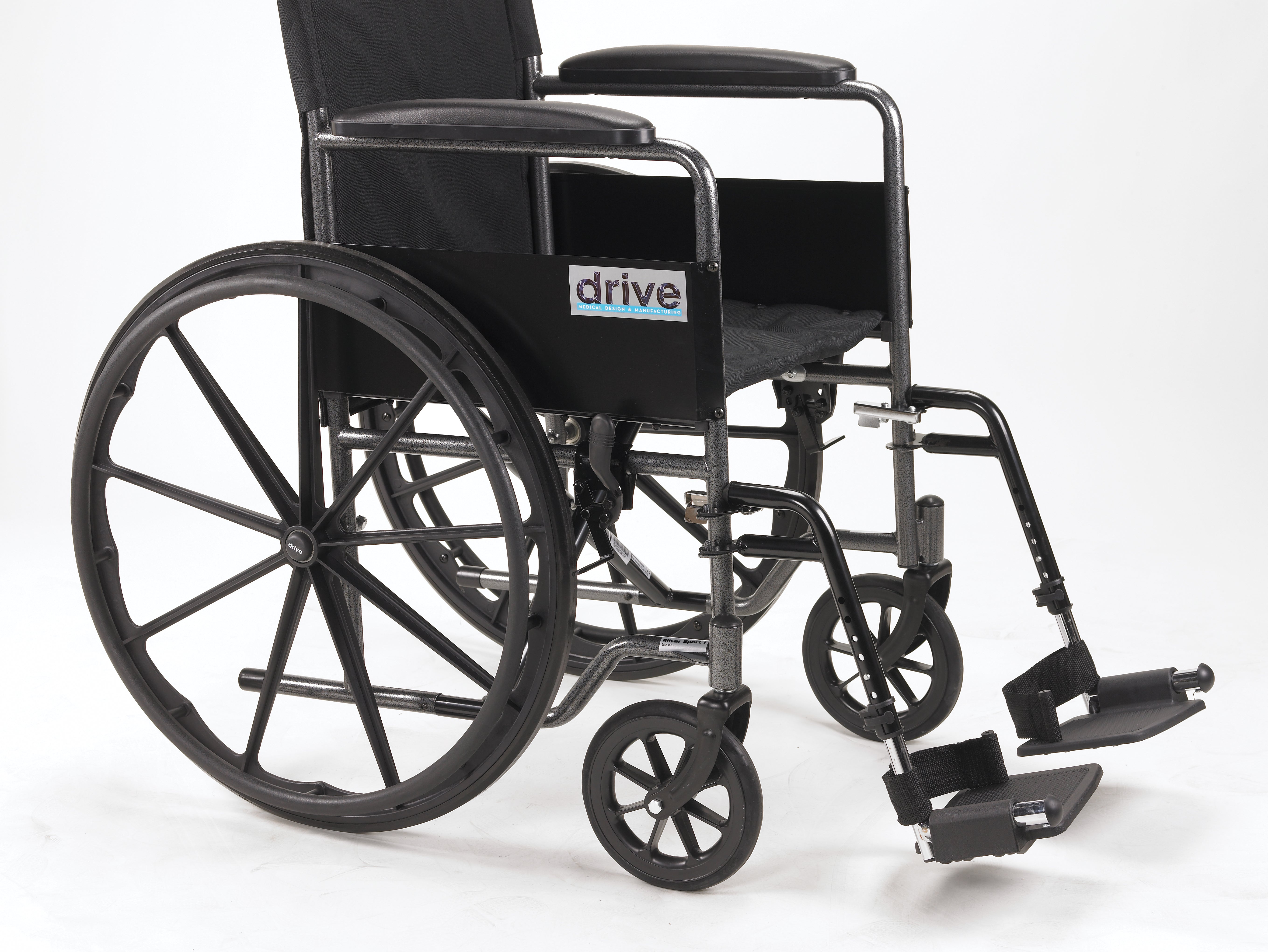 wheelchair 18-inch seat width side view with full arms and footrests
