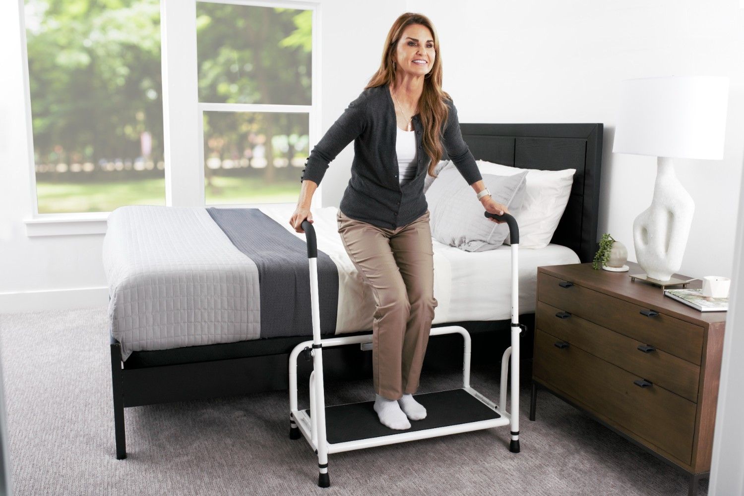 Stander Step - White: Sturdy, stylish step stool for easy access and safety. Ideal for home or office use, enhancing convenience and stability.