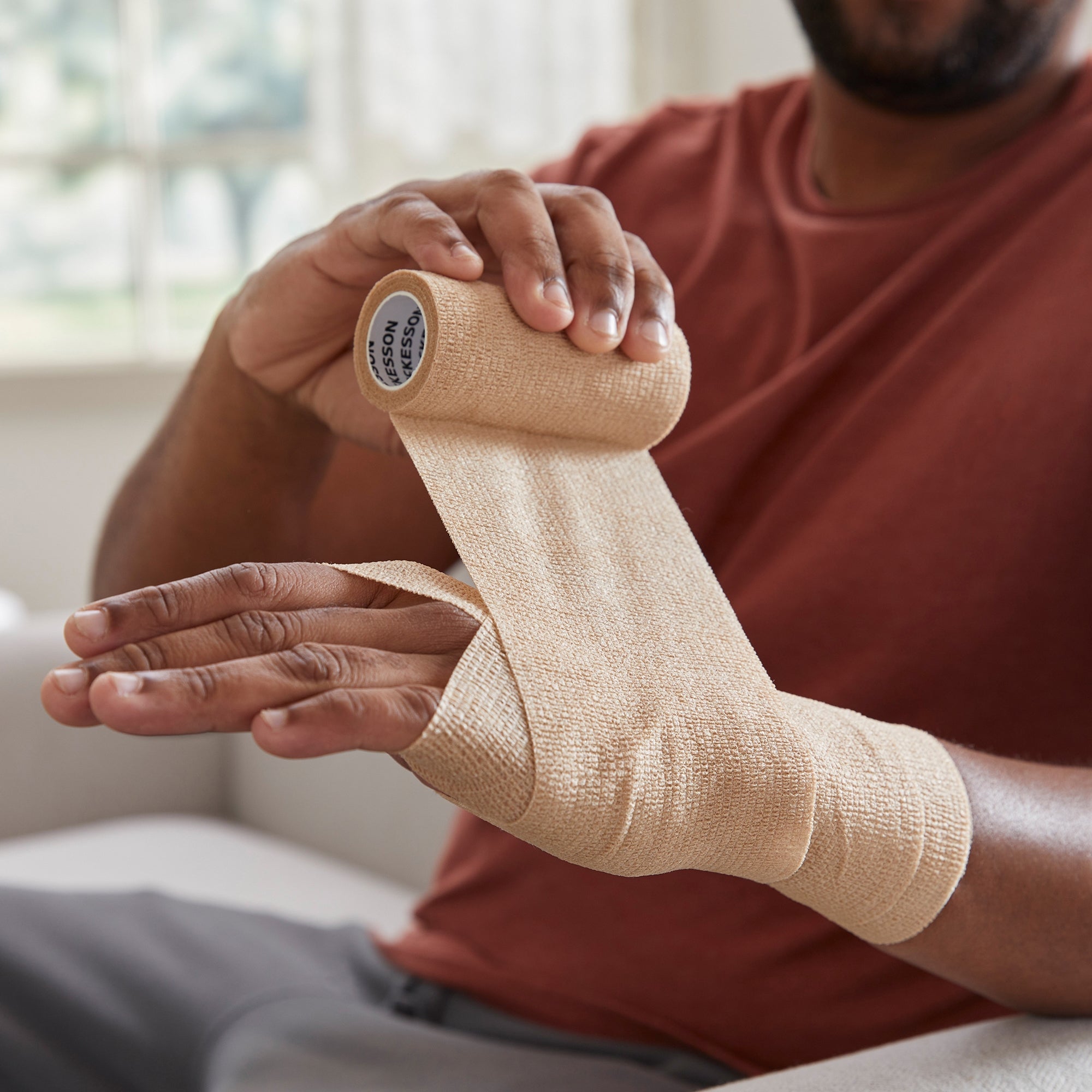 Cohesive Bandage McKesson 4 Inch X 5 Yard Self-adherent Closure Tan NonSterile Standard Compression, Packaging Type- Case