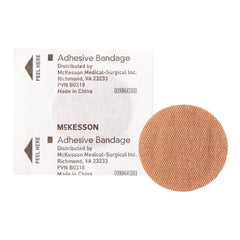 Adhesive Spot Bandage McKesson 1 Inch Fabric Round Tan Sterile, Packaging Type- Case