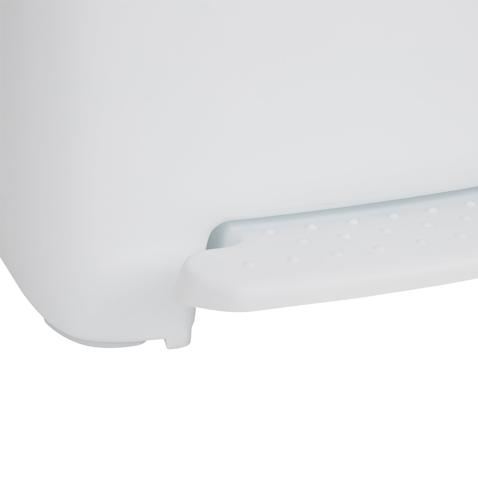 Close-up view of white dustbin pedal.