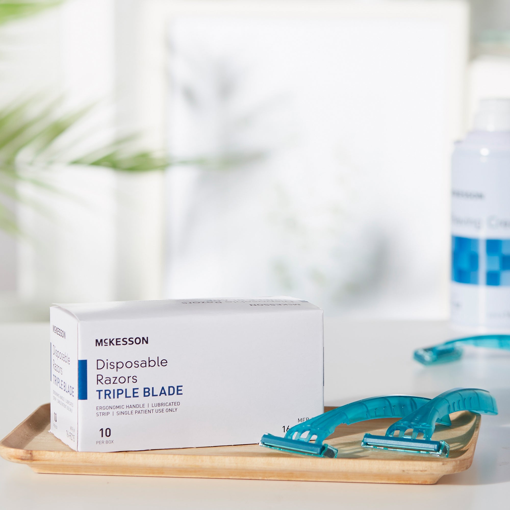 Personal Razor with Lubricating Strip McKesson Single Edge Triple Blade NonSterile Disposable, Packaging Type- Each