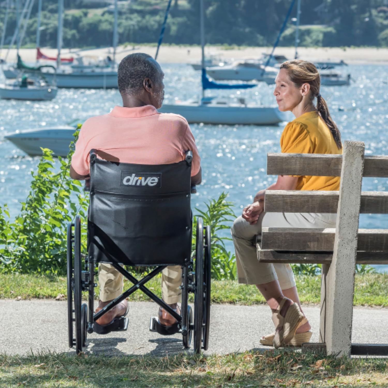 Drive Medical Econ Rem Wheelchair with Detachable Arm and Swing-away Footrests ,8" front Wheels ,Carry Pocket On Backrest 350 lbs Weight Capacity  ,10965J