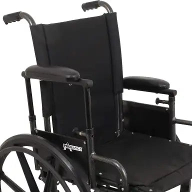 ProBasics K4 Lite 16x16 wheelchair – swing-away footrest and quick-release rear wheel detail