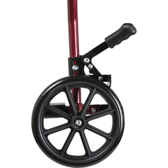 Compact aluminum transport wheelchair folded for storage