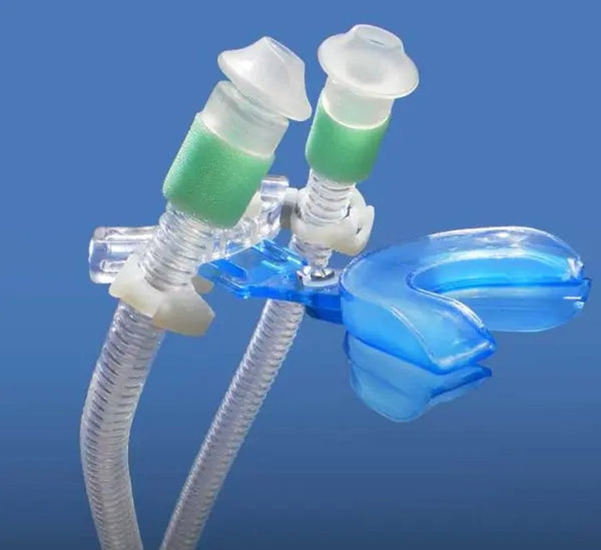 CPAP Pro II No-Mask System showing the blue bite-wing mouthpiece connected to adjustable nasal puffs and clear air tubes