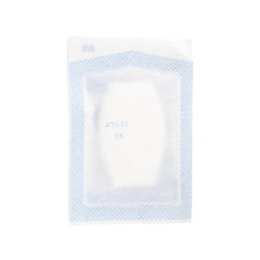 White pillow with blue polka dot border